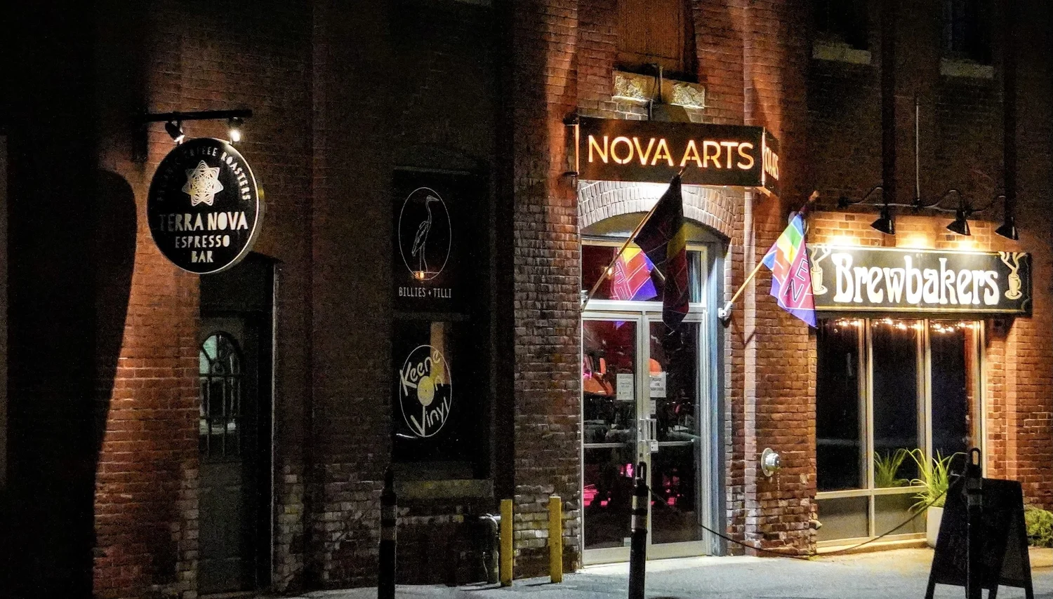The crowd outside Nova Arts on Emerald Street at night