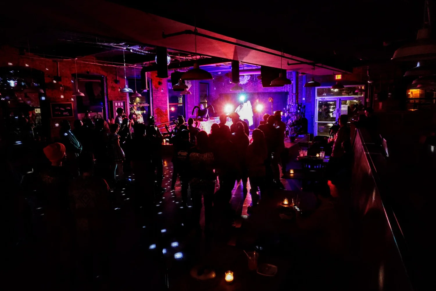 A band playing to a full room at Nova Arts